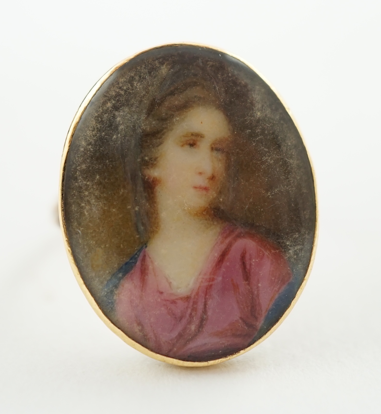 A George III gold memorial ring inset with an ivory miniature of a lady